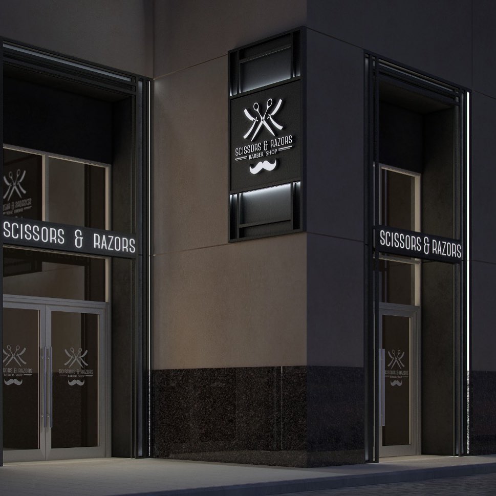 Scissors and Razors Gents Salon entrance with illuminated storefront signage in Dubai